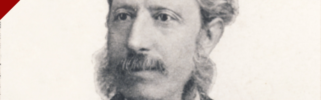 Primo piano del volto di Giovanni Capellini con pettinatura tipica del periodo