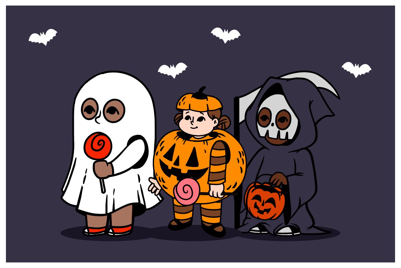 Tre bambini con tipici vestiti da Halloween e l'immancabile zucca arancione